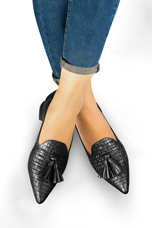 Satin black women's loafers with pompons. Pointed toe. Flat flare heels. Worn view - Florence KOOIJMAN